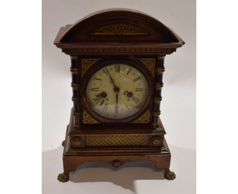 Late 19th century mahogany parcel gilded bracket clock with cast metal paw feet, 40cm high  