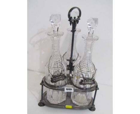 VICTORIAN DECANTER SET, a plated 3 bottle stand containing 3 cut glass decanters with multi rimmed necks with plated labels f