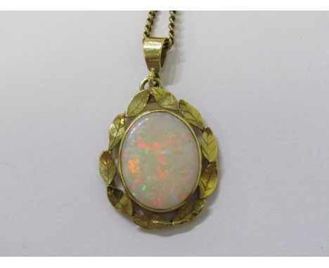 18ct YELLOW GOLD OPAL PENDANT, in foliate design setting, good colour opal showing full spectrum of colour (opal does have sl