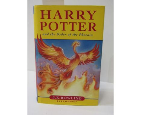 HARRY POTTER, J. K. Rowling "Harry Potter and the Order of the Phoenix", 2003 first edition, signed by author in original dus