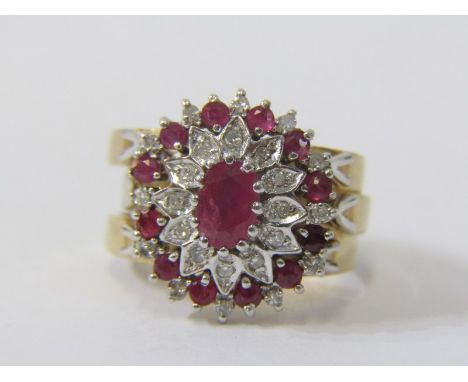 9ct YELLOW GOLD RUBY AND DIAMOND TRIO RING, principal ruby and diamond cluster with fitted crescent design rings either side 