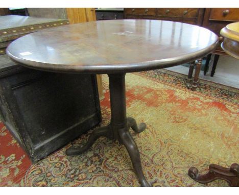 GEORGIAN MAHOGANY SUPPER TABLE, tilt top with bird cage action and plain cabriole tripod base, 73cm diameter 