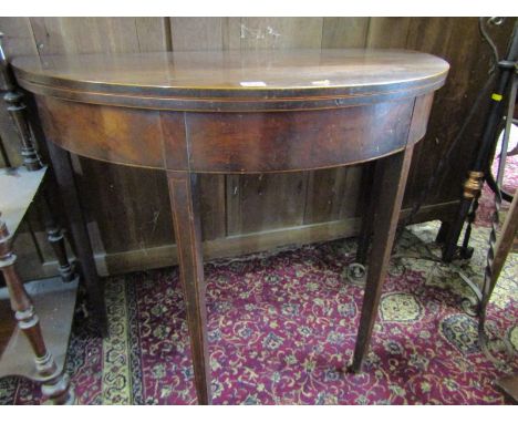 SHERATON MAHOGANY DEMI-LUNE FOLD TOP CARD TABLE, inlaid edging and tapering square section legs, 90cm width 