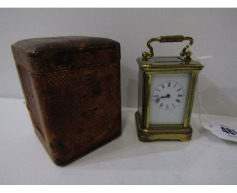 MINIATURE BRASS CASED CARRIAGE CLOCK, bevel glass panels, together with antique carry case, 8cm height 