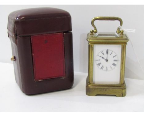 MINIATURE BRASS CASE CARRIAGE CLOCK, with plain enamel face and indistinct makers stamp, 8cm height with carry case 