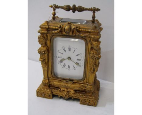 ORNATE GILT METAL CASED CARRIAGE CLOCK, classical column support and bevel glass window, 16cm height 