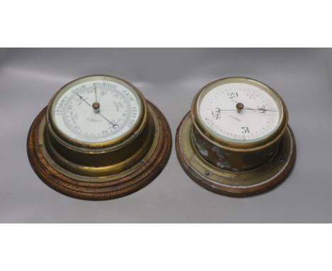 A John Barker &amp; co brass bulkhead barometer and another by Kelvin Bottomly &amp; Baird ltd., diameter 27. 5 cm**CONDITION