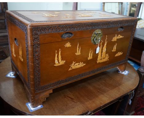 A Chinese camphorwood trunk, length 104cm, depth 53cm, height 58cm**CONDITION REPORT**PLEASE NOTE:- Prospective buyers are st