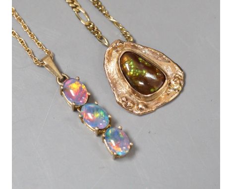 Two modern 9ct and opal set pendants, on 9ct gold chains, gross weight 10.6 grams.**CONDITION REPORT**PLEASE NOTE:- Prospecti