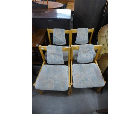 A set of four Ercol 775A model beech and upholstered chairs 