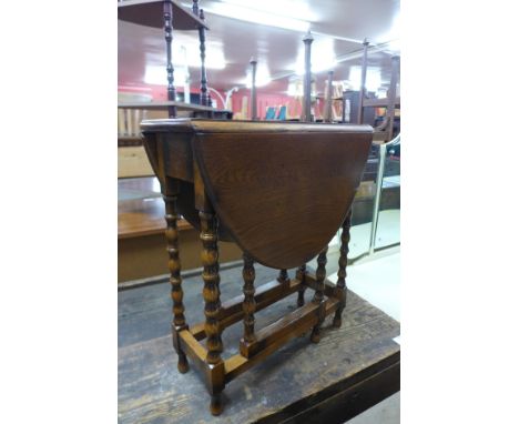 A small oak bobbin turned gateleg occasional table 