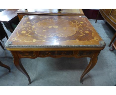 A Spanish inlaid mahogany and gilt metal mounted card table 