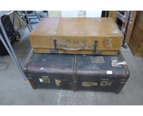 Two early 20th Century suitcases and a steamer trunk 