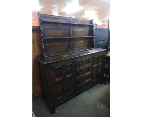 An Ercol dark elm dresser 