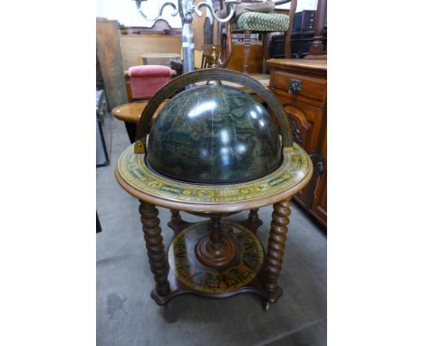 A terrestrial globe cocktail cabinet 