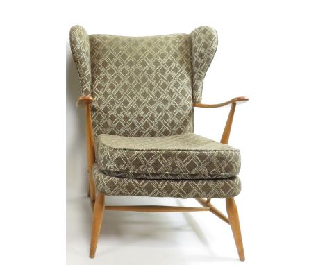 An Ercol beech and elm armchair