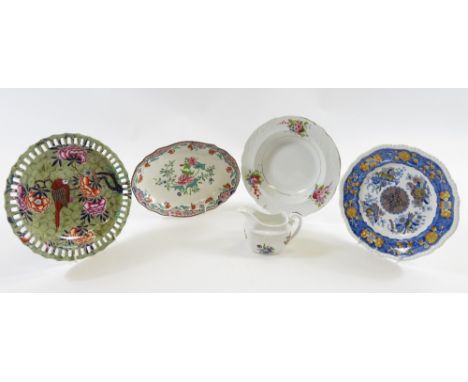 A Spode trophies pattern plate, an Oriental style plate with pierced edge, an oval Indian tree type dish; a moulded and flora