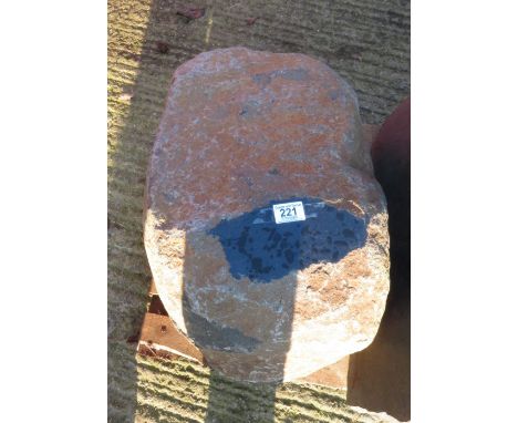 A granite boulder with small polished surface, 28cm high