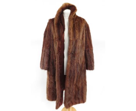 A lady's brown fur coat by Maxwell Croft, London and Bath, silk lined with internal tie and hook &amp; eye fastening, approxi