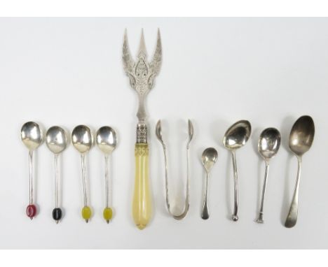 A pair of silver sugar tongs; four silver plated bean end coffee spoons; two silver tea spoons; a silver preserve spoon; and 