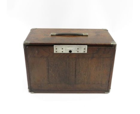 A mid century oak eight drawer tool cabinet, 43cm wide, 28.8cm high, 21.5cm deep