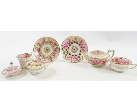 An early 19th century Spode ring tree with gilt and pink painted rose pattern together with a small teapot, three cups and tw