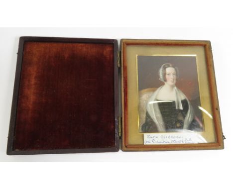 A 19th century painted portrait miniature of a seated woman, label attached states Ruth Clibborn  nee Richardson" in a fitted