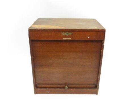 A mid century “Ezy series” oak tambour front filling cabinet