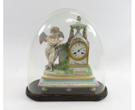A 19th century German ceramic clock with a single standing cherub, white enamel dial, eight day movement standing on six bun 