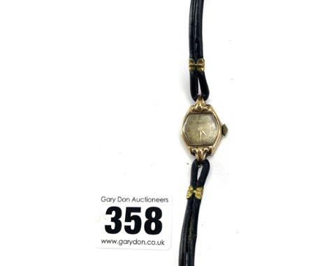 9k gold Rotary ladies watch with black leather strap, not working, total w: 10.5 gms