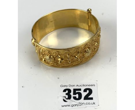 Gold plated embossed bangle marked 'Alpacca'