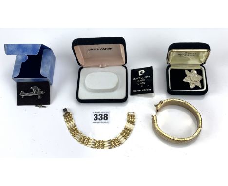 Boxed Pierre Cardin gold plated bracelet, gold plated bangle, boxed Belleek flower brooch and boxed Avon silver plated airpla