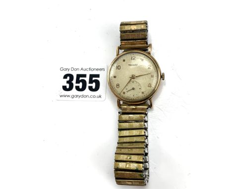 9k gold Rotary gents watch with plated elasticated strap, working. Total w: 40.5 gms