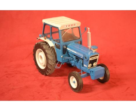 A Universal Hobbies 1/16th scale Ford 7600 2WD tractor, with box, as new 