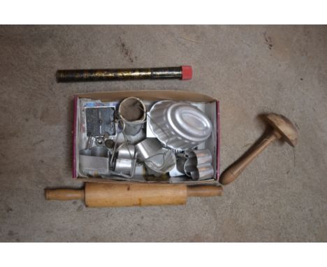 A small box of jelly moulds, rolling pin etc.