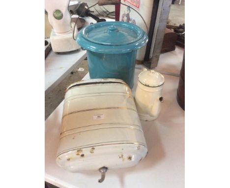 An enamel bucket with lid; an enamel teapot and further enamel container