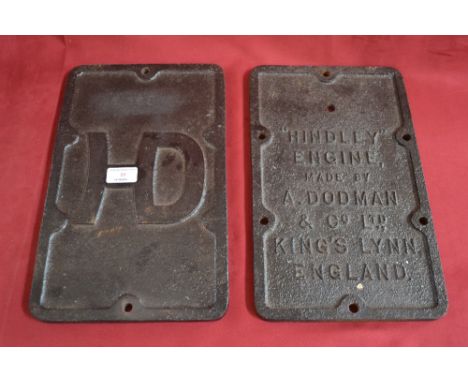 Two cast iron name plates, one H.D. and one Hindley engine, made by A. Dodman & Co., Ltd., of Kings Lynn, England, (22cm x 36