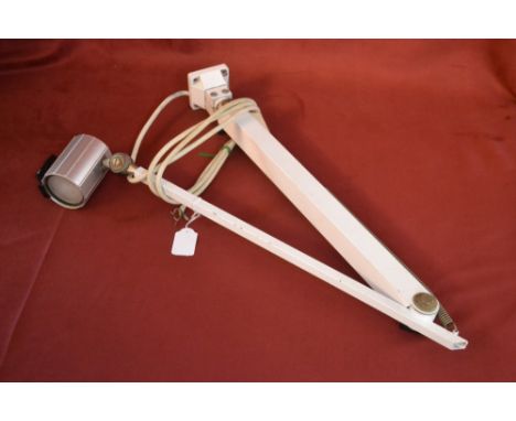 A white industrial/medical extending work light