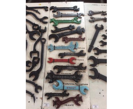 A display board of combination spanners from a variety of manufacturers from the U K and Europe including J Wallace & Sons Lt