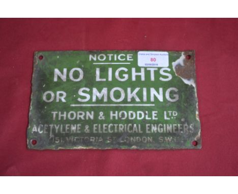 A small enamel sign "No Lights or Smoking", Histhorn & Hodell Ltd., Acetylene and Electrical Engineers, 151 Victoria Street, 