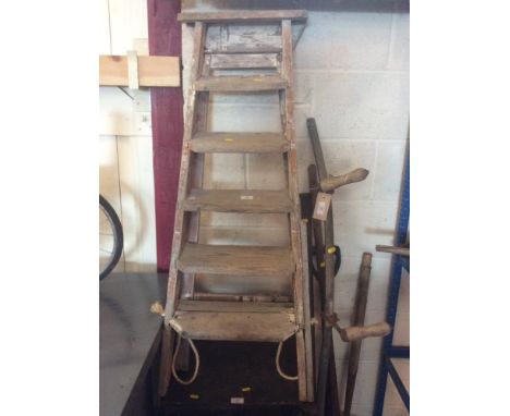 A small wooden step ladder AF