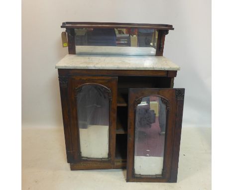 A Victorian rosewood chiffonier, with shelf to back and marble top, having two glazed doors (one detached), H.120 W.84 D.42cm