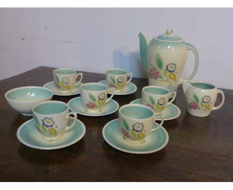 An Art Deco Susie Cooper coffee set: coffee jug H: 19cm, milk jug, sugar bowl and 6 cups and saucers 