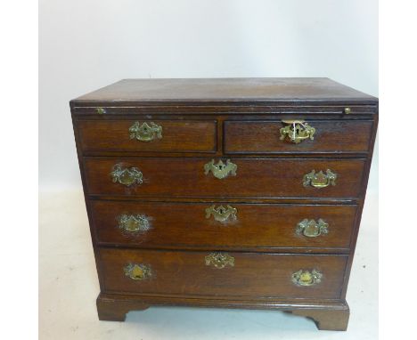 A 19th century mahogany chest of two short over three long drawers, with brushing slide, raised on bracket feet, H.82 W.85 D.