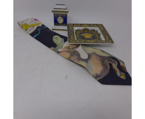 A Gianni Versace silk tie, together with a Rosenthal for Versace Medusa Blue table clock of architectural form, marked to bas