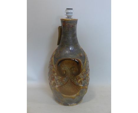A large West German pottery lamp base of abstract form in shades of grey, gold and deep red, numbered to base, H: 58 x W: 28c