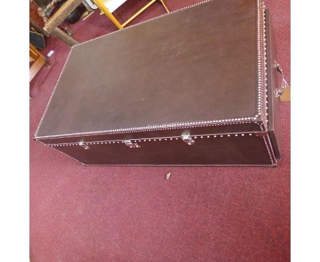 A Dentro Vittoria Steamer Trunk, upholstered in studded chocolate brown leather and having two side drawers, H.43 W.120 D.70c