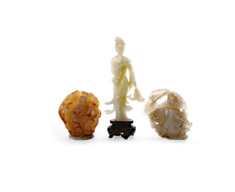EARLY 20TH CENTURY CHINESE JADE FIGURE OF GUANYIN21cm high, on wooden stand; along with a fish group and another figural piec