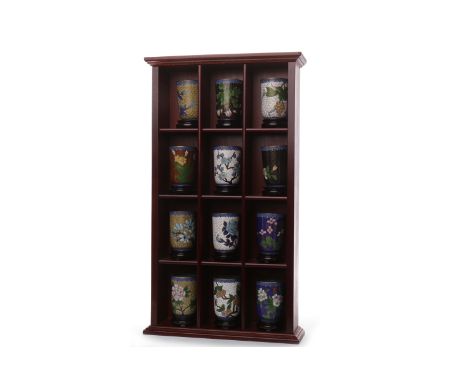 COLLECTION OF CHINESE CLOISONNE ENAMEL BEAKERSwith wooden stands, in a wooden display case, the display case 50.5cm high 