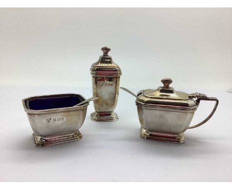 Garrard &amp; Co; A Hallmarked Silver Three Piece Cruet Set, G&amp;Co Ltd, Birmingham 1956, of Art Deco style with blue glass